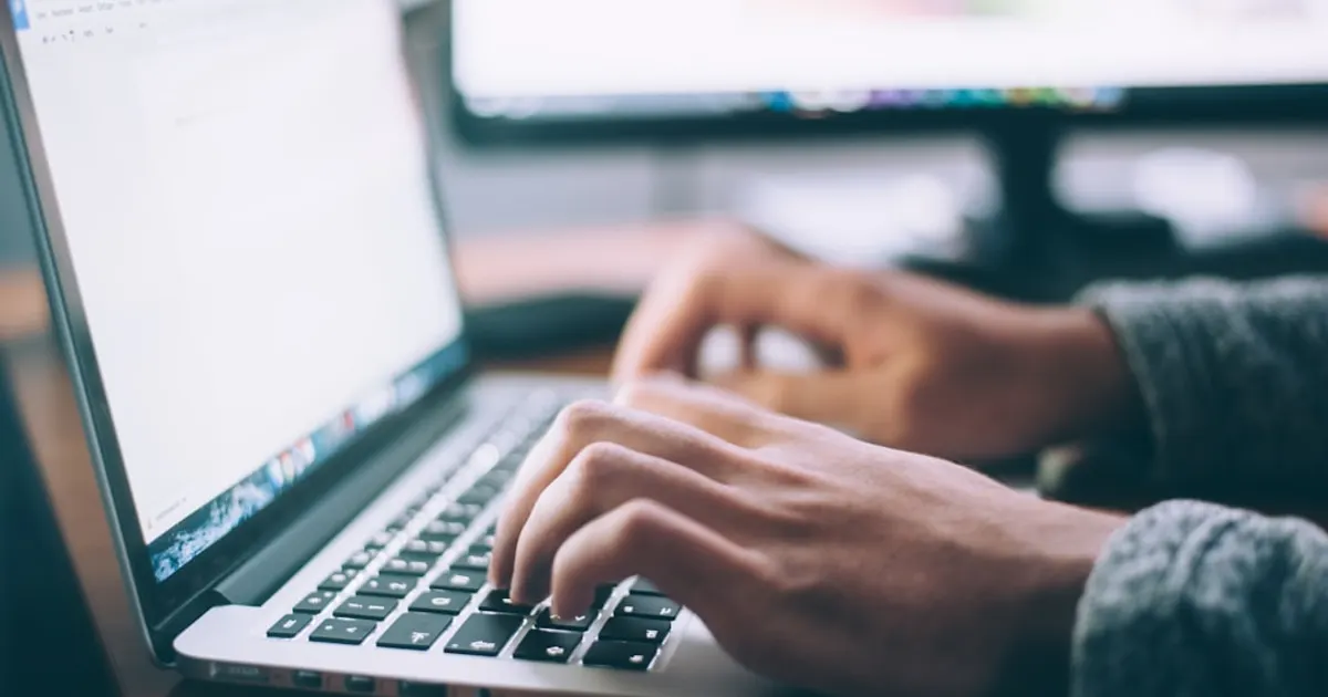 Person using MacBook Pro