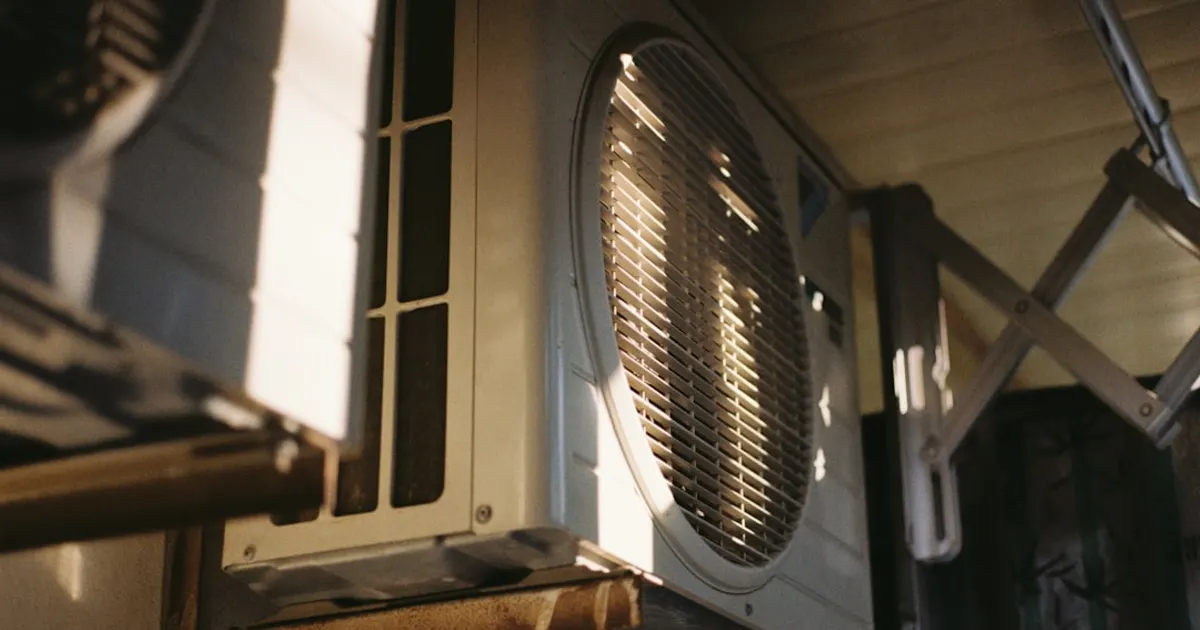 Close-up of an air conditioning unit on a sunny day.